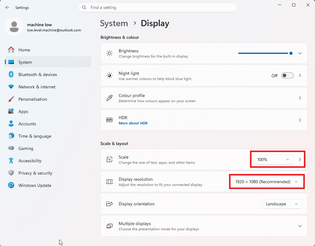 Windows 11 Display settings with Scale set to 100 percent and Display resolution set to 1920 by 1080
